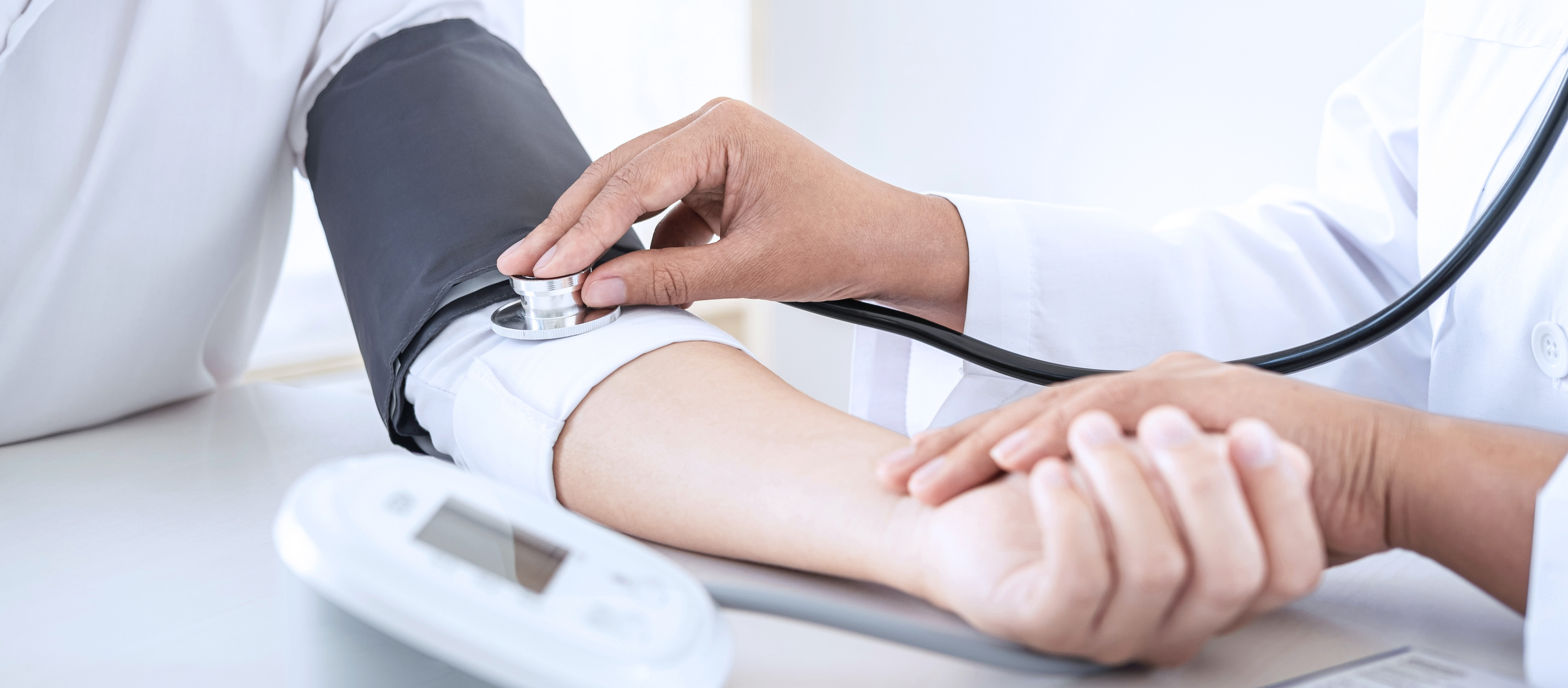 Doctor Taking a Patient's Blood Pressure  